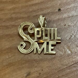 ‘’Spoil Me’’: 14k yellow gold charm .
